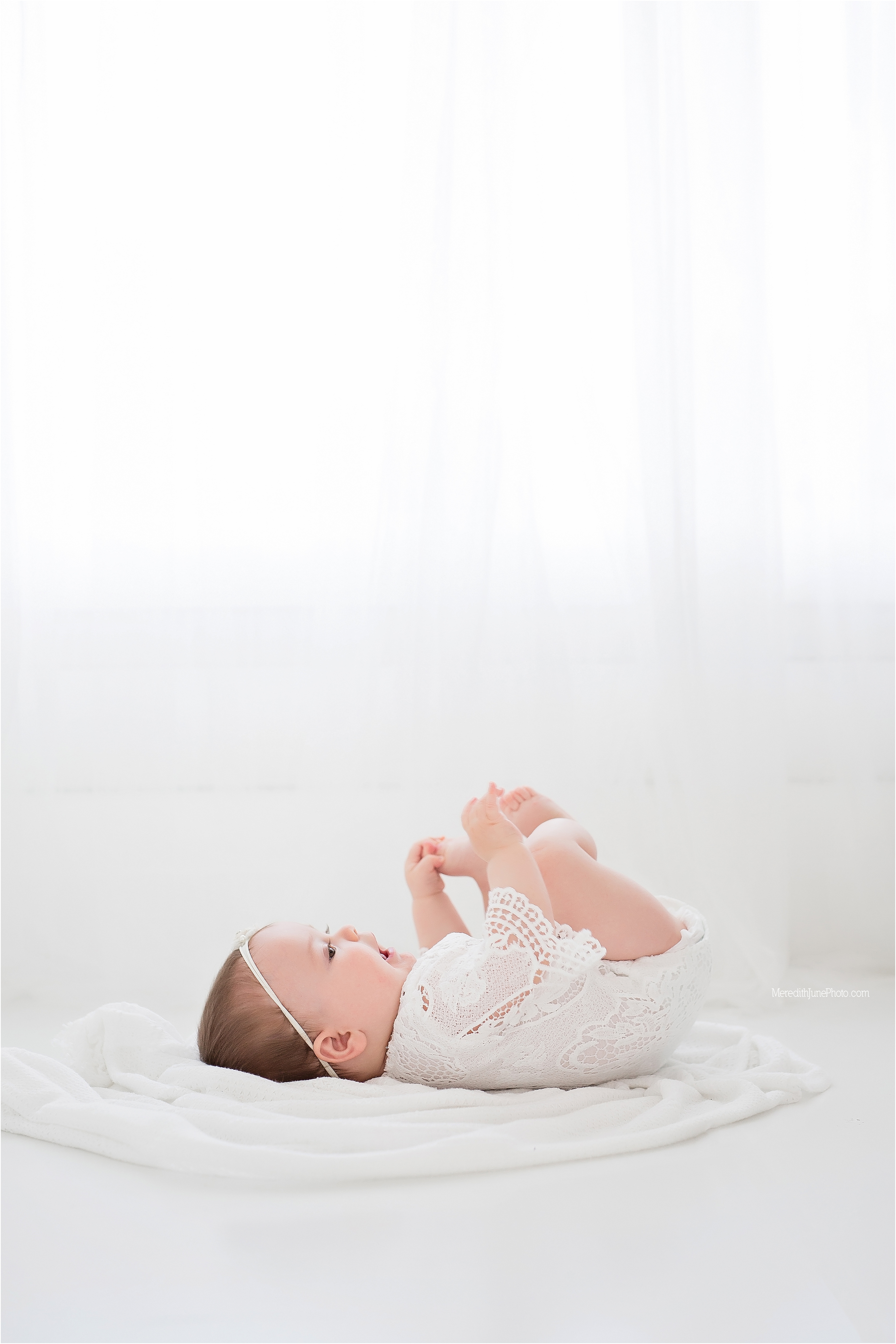 Bright and airy milestone session for baby girl