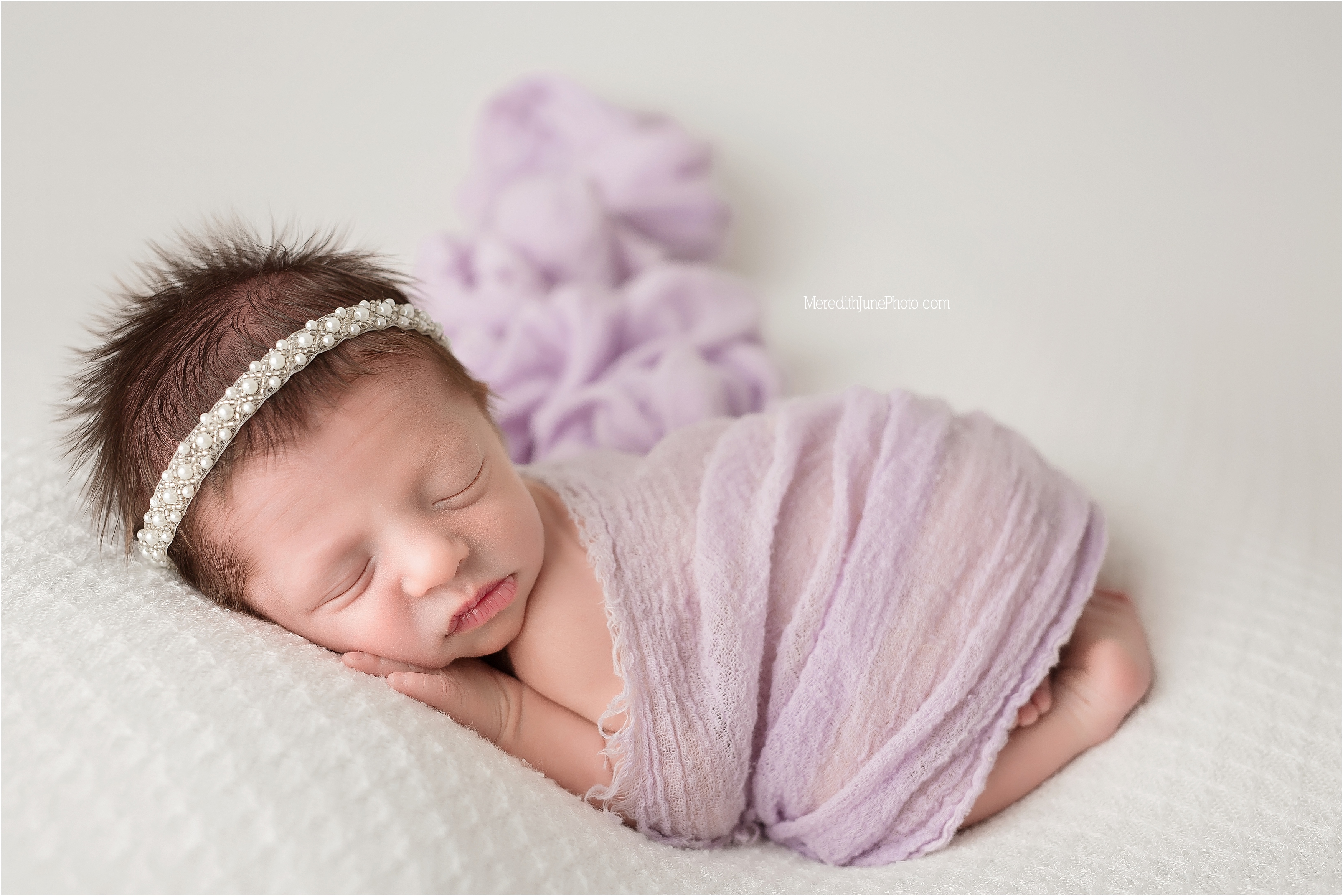 Purple and pink newborn baby girl session