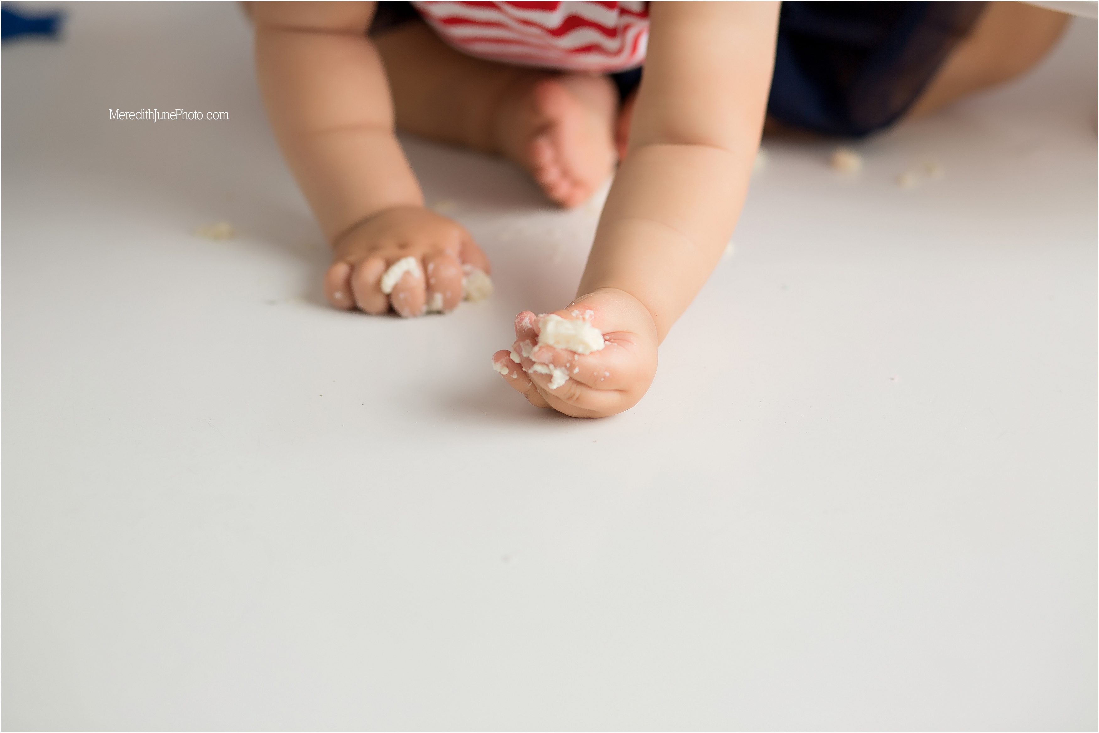 Emerson loved her cake smash at Meredith June Photography 