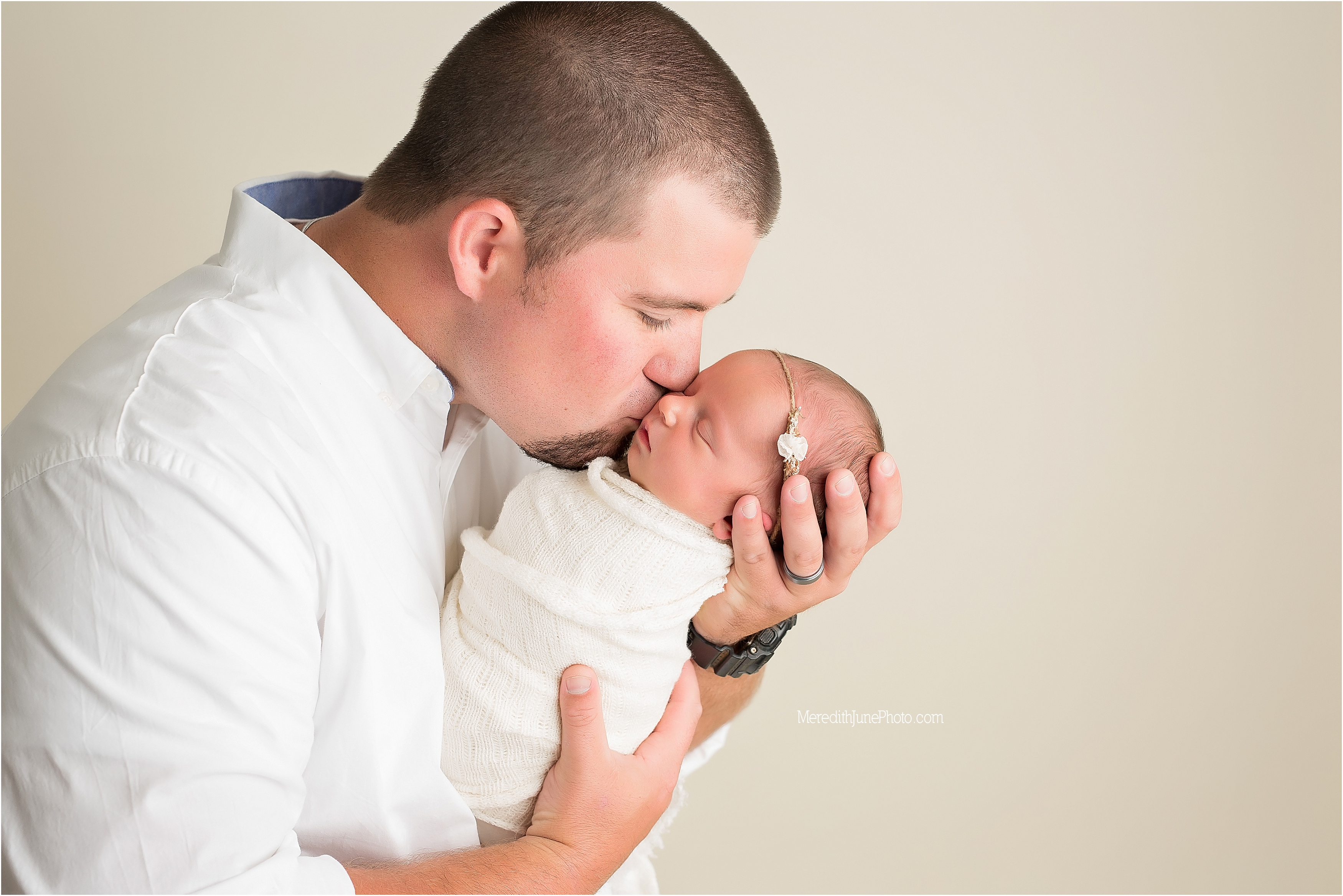 Dad and baby during Adlayn's newborn session