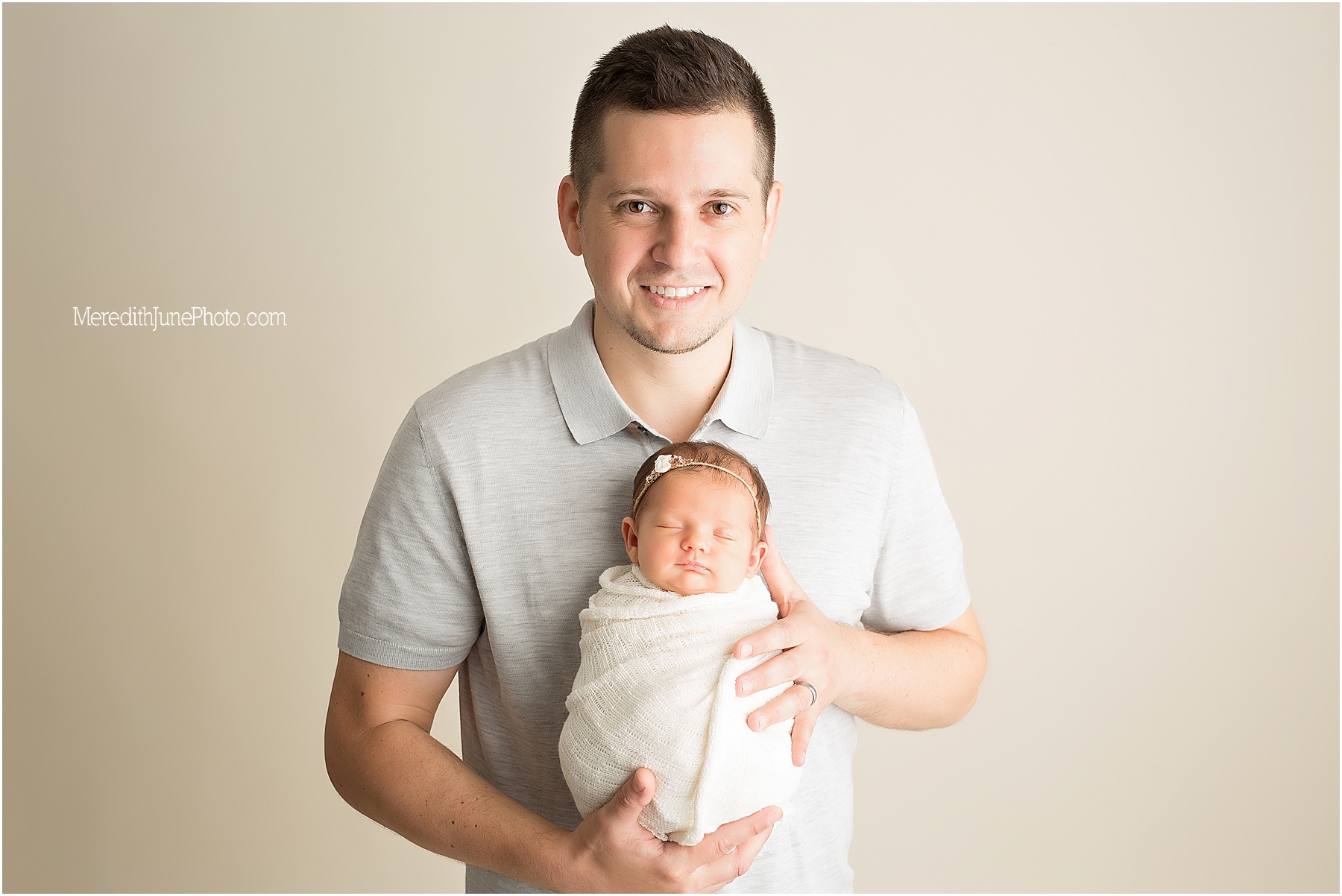 Baby girl Mya with dad during newborn session