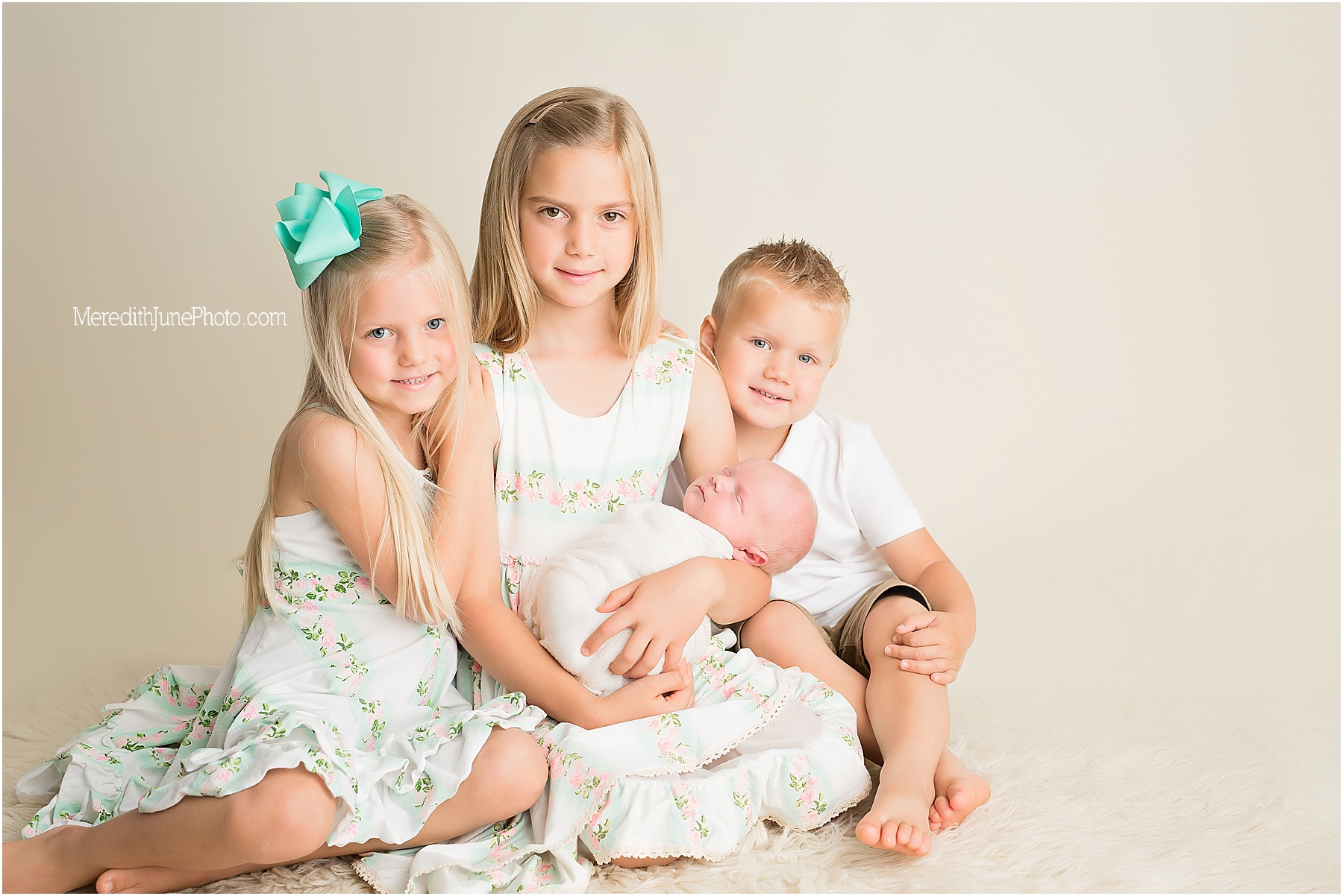 baby boy Miller with siblings during newborn and family session
