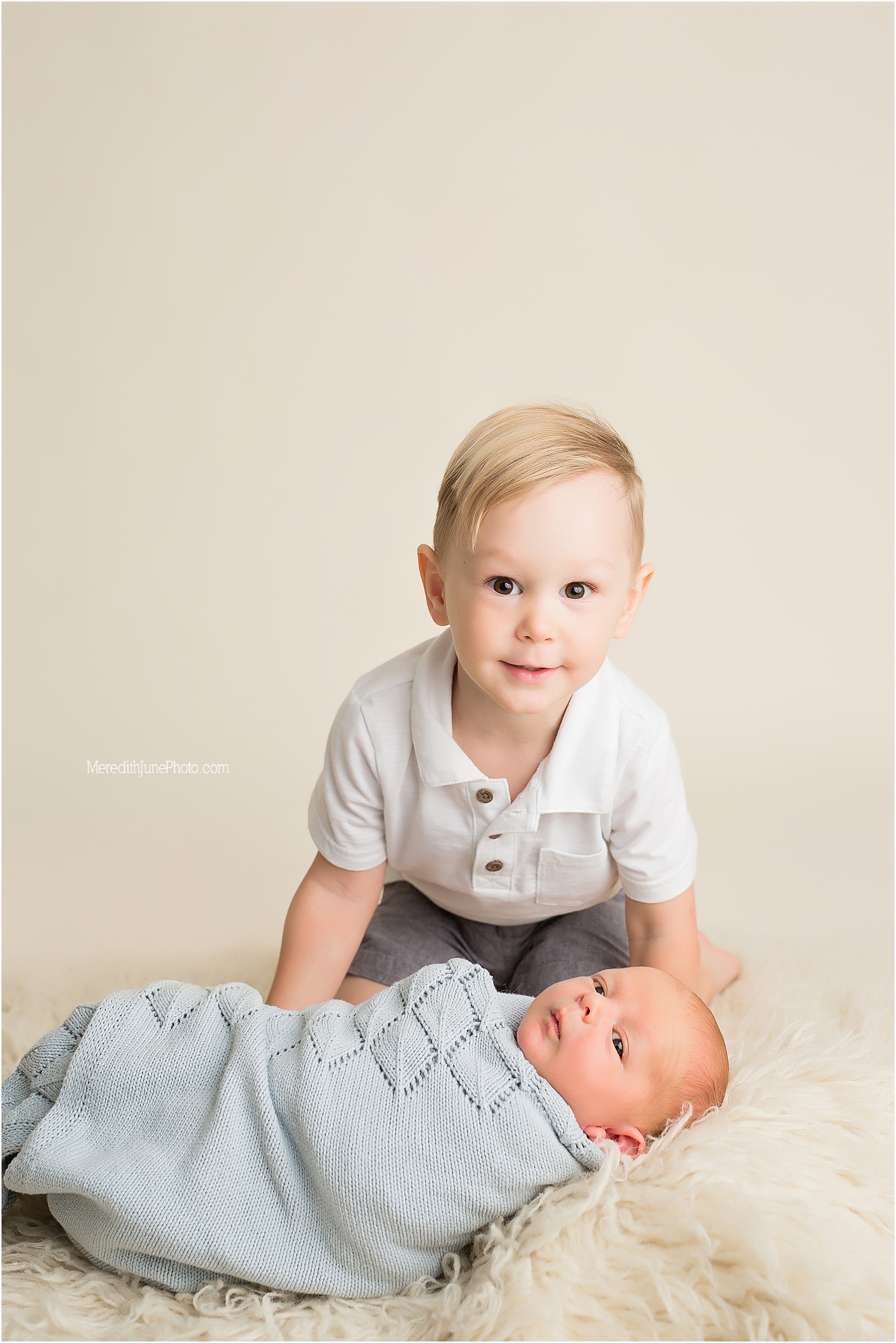 sibling shots during newborn session 