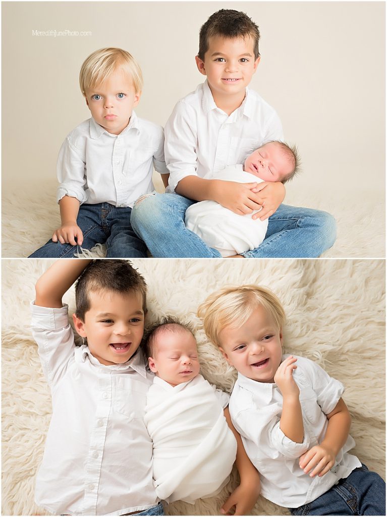 baby boy carter with brothers during newborn session