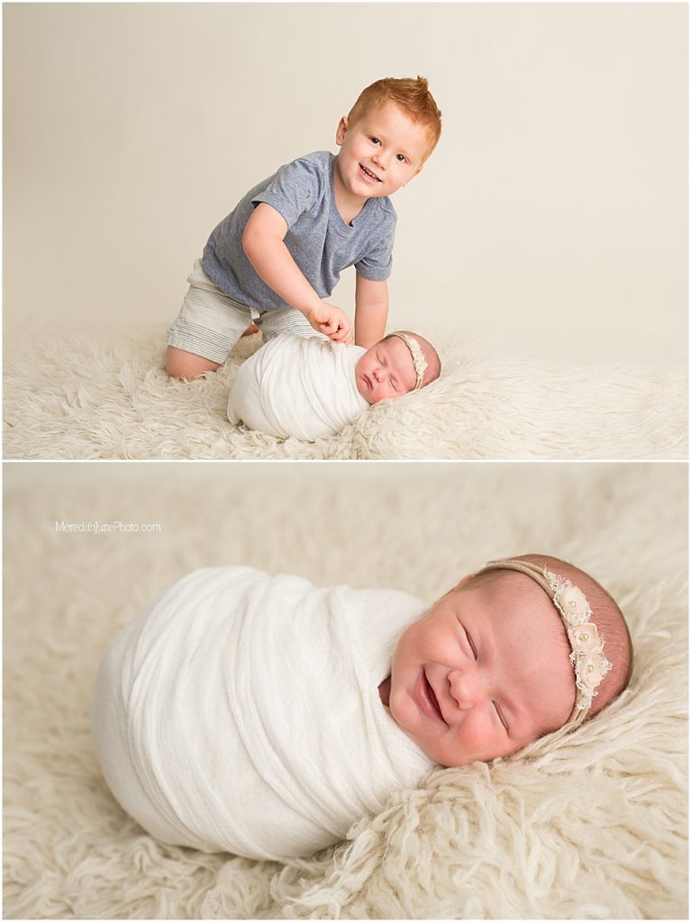 baby girl with big brother during newborn session