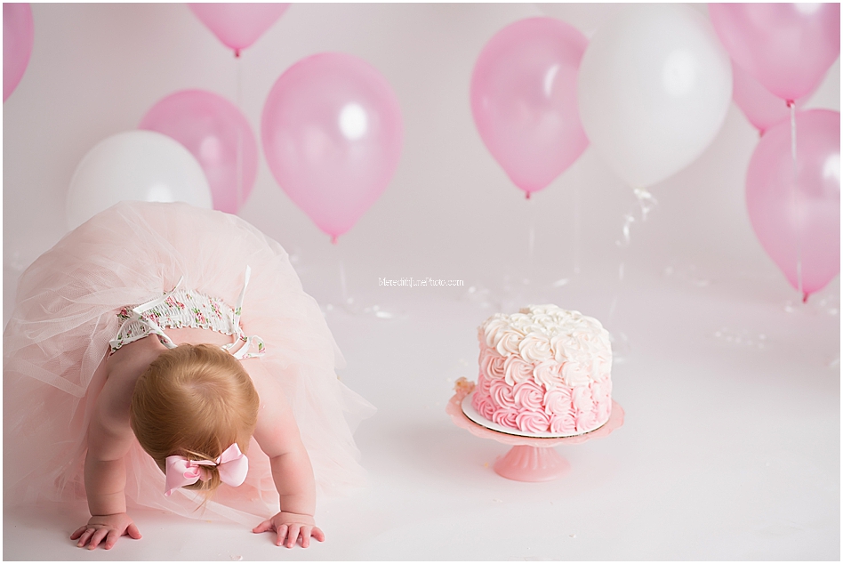 Pink and white cake smash session for one year old 