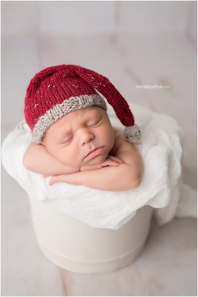 Studio session for newborn baby boy with Christmas theme