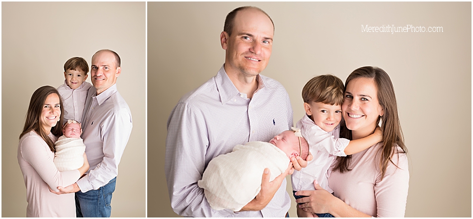Newborn posing with family by MJP in Charlotte NC