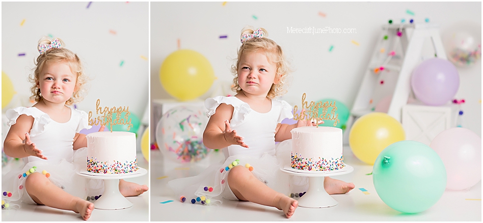 colorful confetti cake smash for Olivias second birthday 
