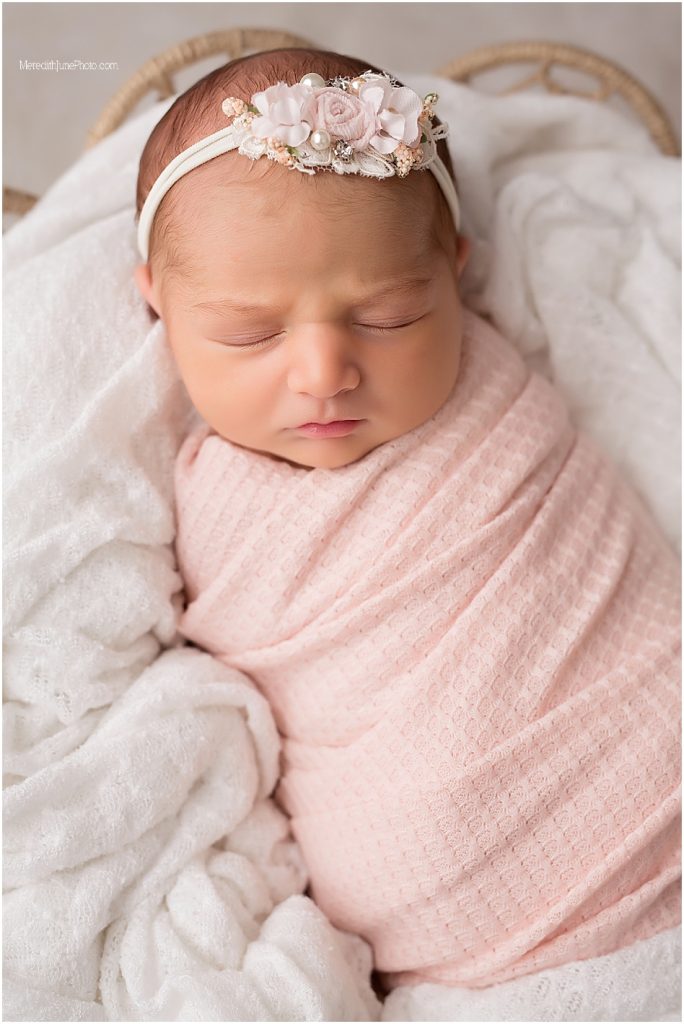 Newborn baby girl pictures in Charlotte photography studio 