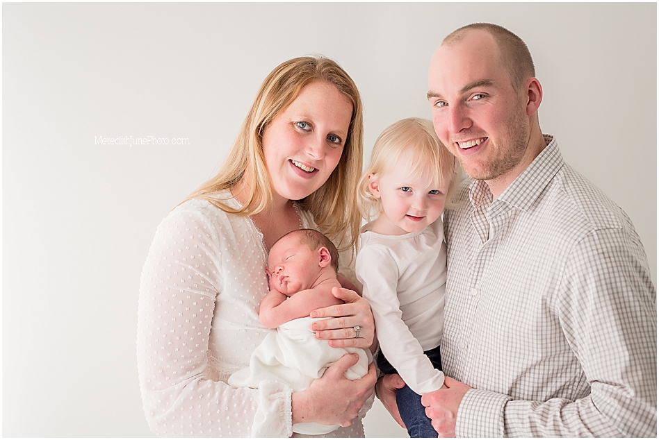 simple studio session for newborn and family