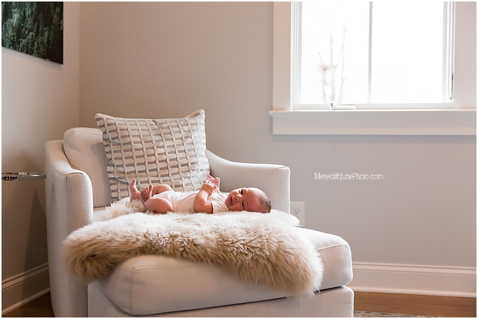 newborn in nursery lifestyle photos