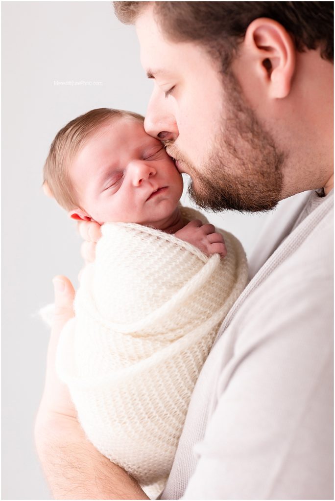 bright & airy photos of dad with newborn baby boy 
