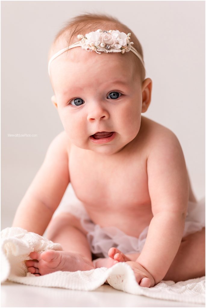 baby girl in tutu at meredith june photography in charlotte nc 